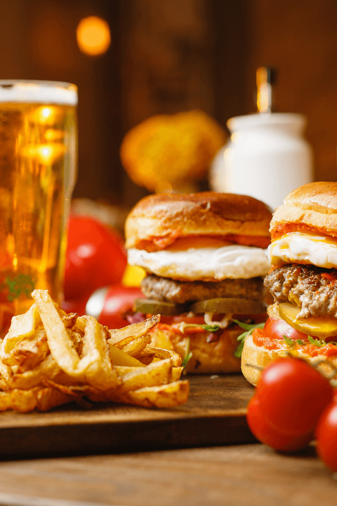 Burgers, fries and a glass of beer