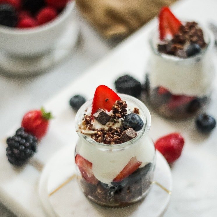 Yogurt parfait with strawberries, blackberries, blueberries and granola